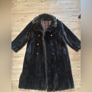 Nice winter coat. I'm not sure what it is made of though.